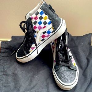 Girls glittery Vans sneakers .